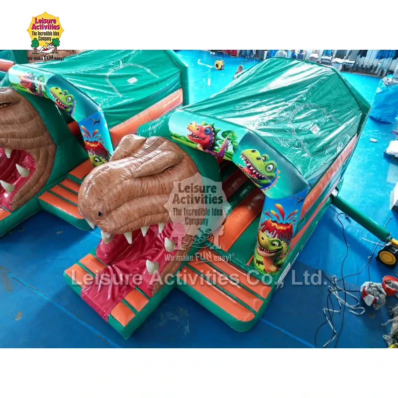 Malé nafukovací skákací hrady pro více hráčů T-REX se skluzavkou